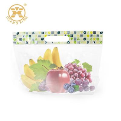 China 0.5kg da fruto los bolsos de plástico transparente de la bolsa de la cremallera del soporte del respiradero para arriba para empaquetar con la cremallera de la manija en venta