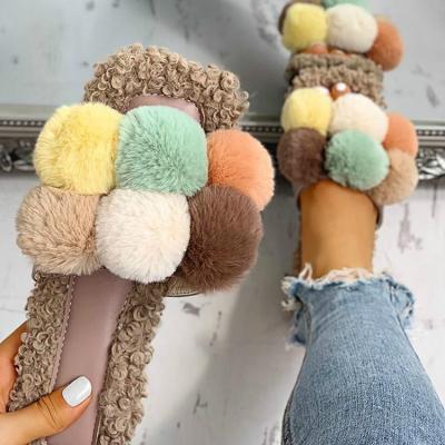 China CUSHIONING Cute Color Fashion Cute Color Plush Pompom Ladies Slippers Furry Warm Home Women Winter Indoor And Outdoor Fur Slippers for sale