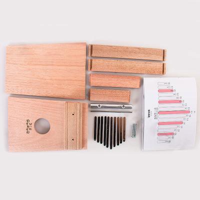 China Wooden Kalimba DIY Kit Solid Mahogany Steel Fittings Handpaint GUITAR Handmade Toys for Kids Including Painting Tools for sale