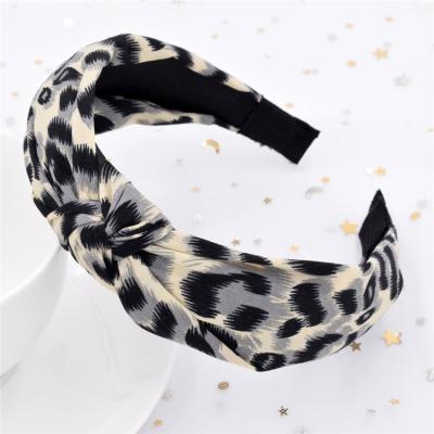 China Hot Selling Cross Cloth Leopard Print Headband Ladies Wide Edge Knot Headband Hair Accessories for sale