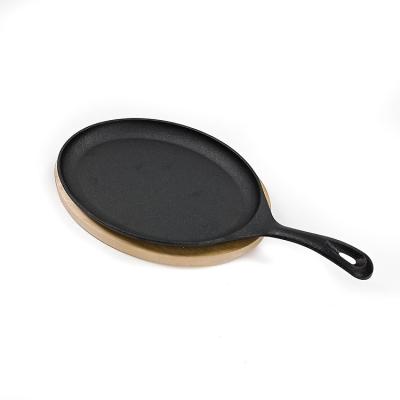 China Matt Black Cast Iron Sizzle-Schotel BSCI met Houten Basis Fajita Te koop