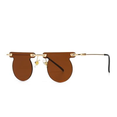 China New Trendy Round Fashion Men And Women Round Irregular Frameless Sunglasses 2022 for sale