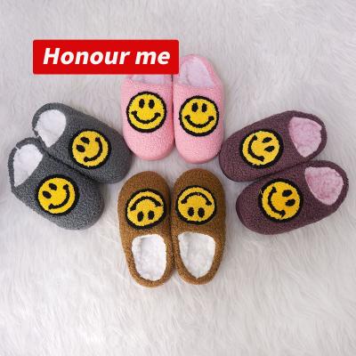 China Cute UHV Thermal Fuzzy Smile Face Baby Indoor New Arrivals Slipper Baby Slippers 2021 for sale