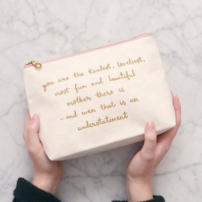 China Fashion Gold Logo Cotton Canvas Cosmetic Bag Custom Logo Gift Bridesmaid Wedding Guests Travel Makeup Pouch for sale