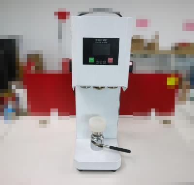 中国 Cans sealing machine Drink bottle sealer Beverage seal machine for Milk tea Coffee Can sealer 販売のため