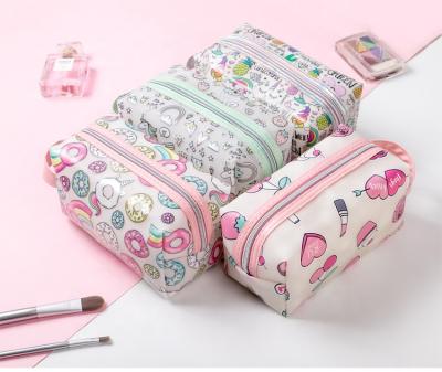 China 2020 New Hot Sale Fashion Jelly Bag Small Cute Beauty Bag With Customized Pattern Printing PVC Travel Makeup Bag for sale