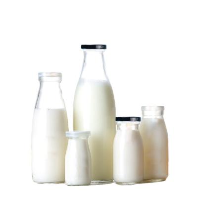 China High Quality Milk Based Formula Grade Factory Price Transparent Milk Glass Bottle for sale