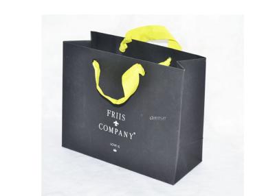 China Eco - Friendly Art Paper Carry Bags White Embossed For Clothes / Clothing / Underwear for sale