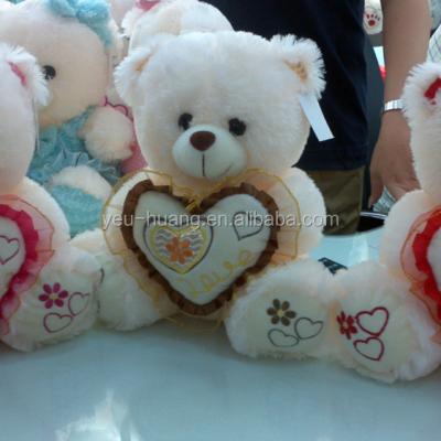 China Custom Stuffed Plush White Valentine's Bear With Heart for sale