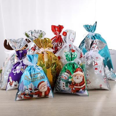 China Custom Fashion Logo Printed Large Santa Christmas Drawstring Gift Bags Colorful Candy Bags for sale