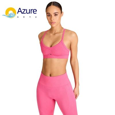 China Breathable OEM Customized Yoga Bra Vest Girl Sports Solid Sexy Bra Cross Stripe Design for sale