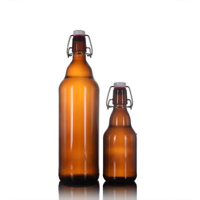 China Custom JO 350ml 1000ml Amber Brown Beer Homemade Beverage Enzyme Glass Beverage Bottles With Swing Top Lid for sale