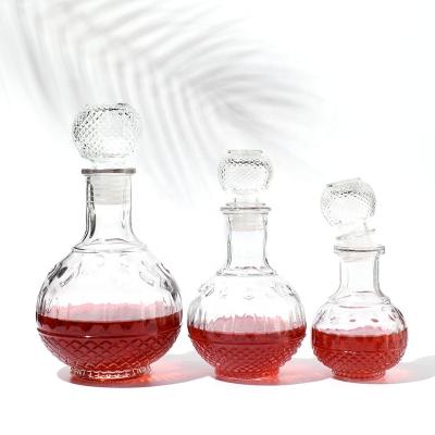 China Hot Sale Beverage JO Cut Out 250ml 500ml 1000ml Round Spirits Vodka Glass Bottom Bottle With Glass Cap for sale