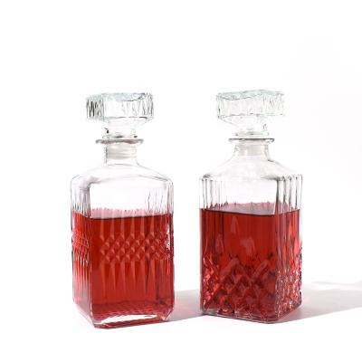 China New Style 500ml 1000ml Empty Beverage JO Style 500ml 1000ml Whiskey Storage Red Wine Empty Sealed Glass Bottle With Lids for sale