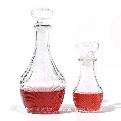 China Beverage JO Factory Price 250ml 1000ml Cut Out Bottom Clear Empty Whiskey Brandy Glass Bottles With Vodka Caps for sale