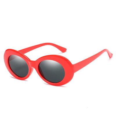 China Retro Fashion Classic Sun Glasses Women Brand Design Plastic Red Sunglasses for sale