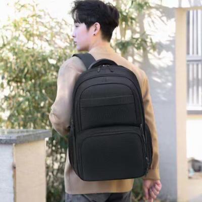 China Shell Trolley Luggage Factory hard customized new fashion men's backpack men's backpack simple anti-splash large capacity management computer school bag for sale