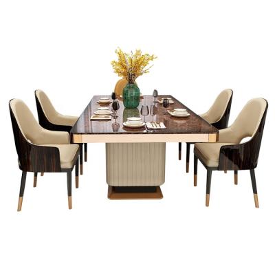 China Modern Design Durable Italian European Dubai Natural Marble Top Luxury Dining Table Set With Leather Bottom for sale