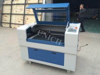 China Small Mini Co2 Laser Cutter For Wood Fabric for sale