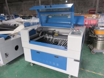 China Flat bed Co2 non metals acrylic laser cutter and engraver machine with red dot for sale