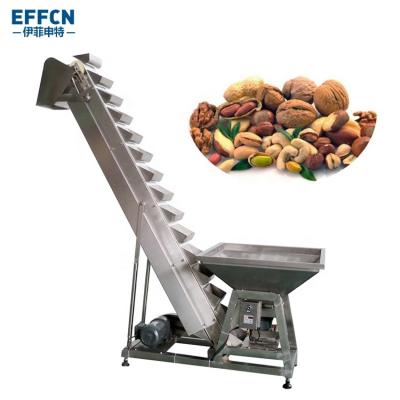 China Heat Resistant Bulk Material Handling Seeds Steel Bucket Type Inclined Feed Conveyor With Vibrator Hopper for sale