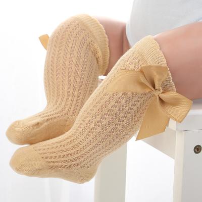 China Spring Breathable Summer Solid Color Infant Toddler Kids Booties New Soft Cotton Baby Booties Bows Cute Princess Girl Knee Socks for sale