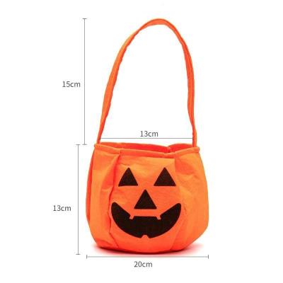 China Halloween Pumpkin Nonwoven Bag Halloween Handbag Three Dimensional Props for sale