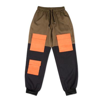 China Custom Anti-wrinkle sportwear drawstring color block men's cargo sweatpants with corduroy pocket for sale