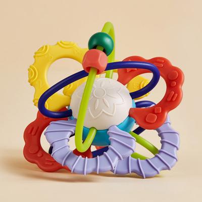 China Rotating Toy Hand Grabbing Rattles Toys Baby Soft Sensory Soft Glue Teethers Water Boiled Milk Teeth Ball For Infant for sale