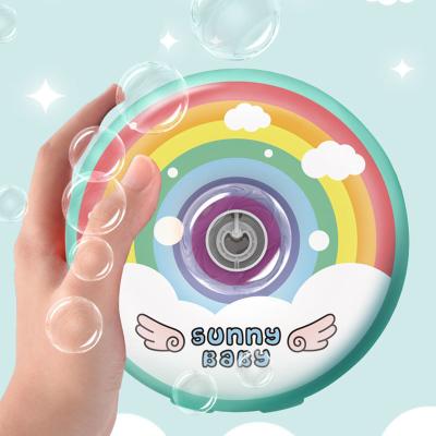 China Outdoor Summer Toy Donuts Design Outdoor Electric Bubble Machine Summer Beach Colorful Igniting Musical Bubble Machine Toys For Children for sale