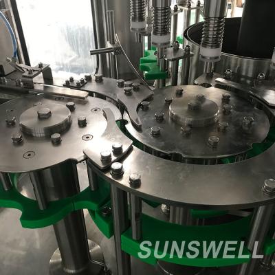 Chine Huile de tournesol rotatoire de la machine de remplissage d'huile de bouteille d'animal familier 36000BPH à vendre