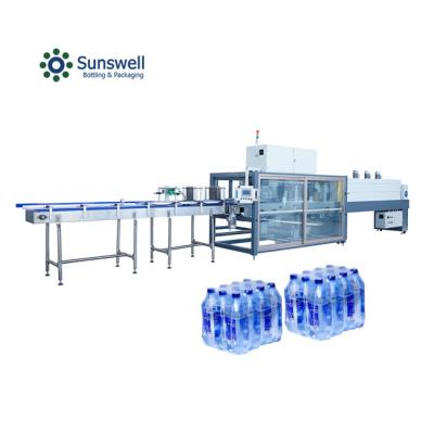 China Flavoured Juice Plastic Shrink Wrapping Machine Soft Drink PE Film Shrink Wrap Machine For Glass Bottles for sale