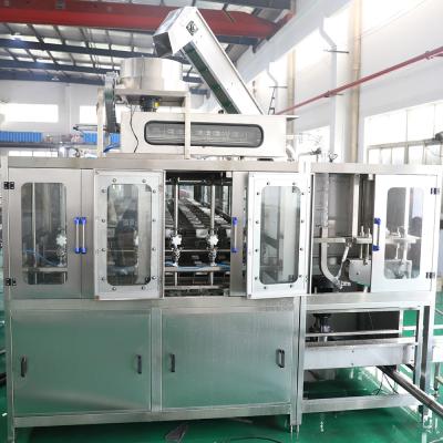 China 150BPH Gravity Hot Fill Bottling Machine 304 Stainless Steel Structure for sale