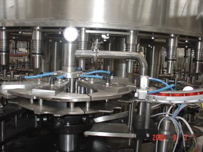 China Automatizado Rotary embotellado de aceite comestible, jarabe de pistón llenado tapado equipo en venta