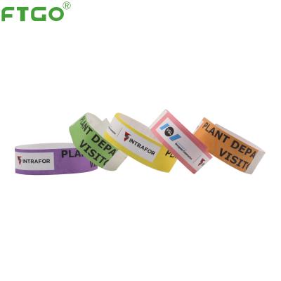 China Gently enough to avoid harm to peel off FTGO party arm band tyvek hand strap tyvek bracelet ID decorative paper wristbands for sale