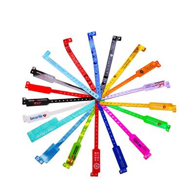 China Waterproof / Waterproof FTGO Easy Wear For Events Festivals Waterproof Wristband PVC ID Adjustable Wristbands for sale