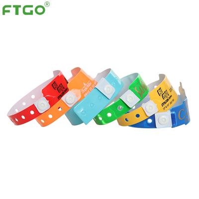 China FTGO FASHIONABLE Wholesale Customized PVC Wristbands Colorful Waterproof ID Wristbands for sale