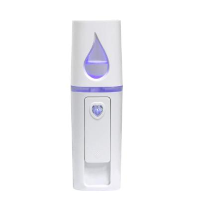 China Hot Portable Handheld Ionic Vapor Machine Moisturizer Sprayer Factory Sale Nano Jet Face Care Beauty Instrument for sale