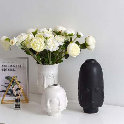 China CLASSIC Creative Living Room Furnishing Ceramic Craft Gift Flower Arrangement Face Vase Home Decor for sale