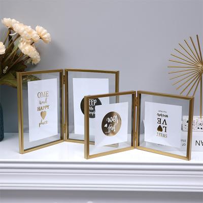 China Pictures set joint view- Nordic style picture frame folding double-sided creative Crystal Glass Metal Frame for sale