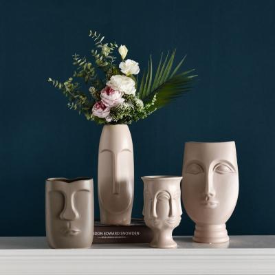 China Nordic Modern Flower Arrangement CLASSIC Homewares Ceramic Art Vase in Face Living Room Decor for sale