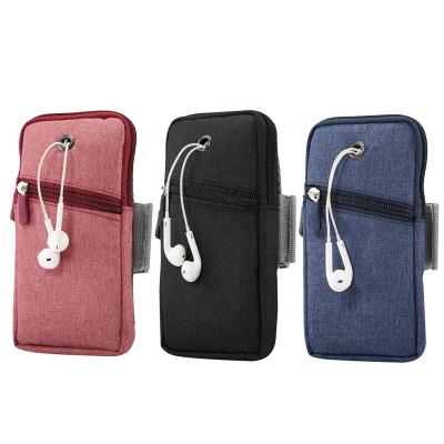 China Hot Selling Anti-fall Under 6.5 Inch Running Waterproof Mobile Phone Armband Bags Phone Arm Bag With Earphone Hole For Mobile Phone for sale