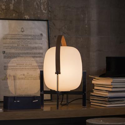 China Study and Bedroom Lighting Portable Nordic Leather Lamp with Middle-Aged Glass Design for sale