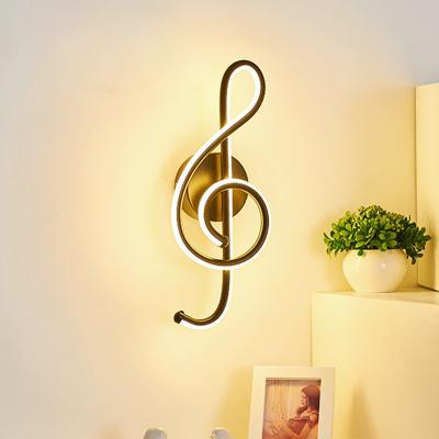 China Lámparas de sala de estar de diseño moderno simple con lámpara de pared de forma musical y luces LED de hotel en venta