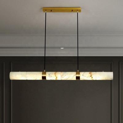 Cina Marble brass chandelier restaurant bar Modern Chinese simple dining table strip pendant lamp in vendita