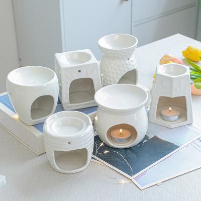 China Factory Customized Ceramic Tealight Candle Holder Warmer Stove Essential Oil Burner Scented Wax Melting Heater à venda