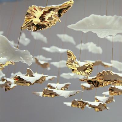 China Custom Ceramic Hanging Pendant Light Luxury Art Craft Decoration Large Hotel White Silver Leaf Chandelier for sale