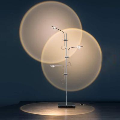 Cina IP20 Rated Bedroom Decorative Sunset Floor Lamp with Adjustable Light Body and Glass Projection in vendita