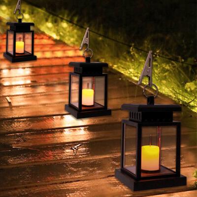 China Hanging Snowproof LED Solar Lantern Light for Outdoor Camping Garden Flickering Candle Smokeless 1-Year Warrant for sale