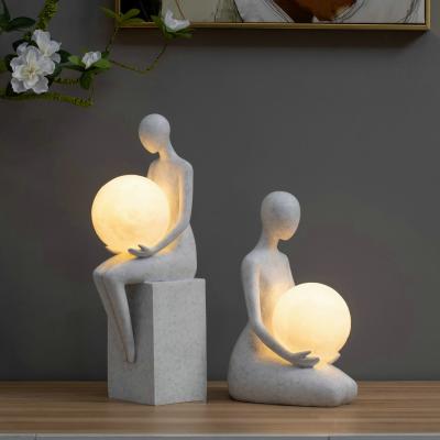 China Minimalist Character Woman Desk Statue Light Lamps for Resin Abstract Lady and Modern Table Lamp Bedroom Art Decor for sale